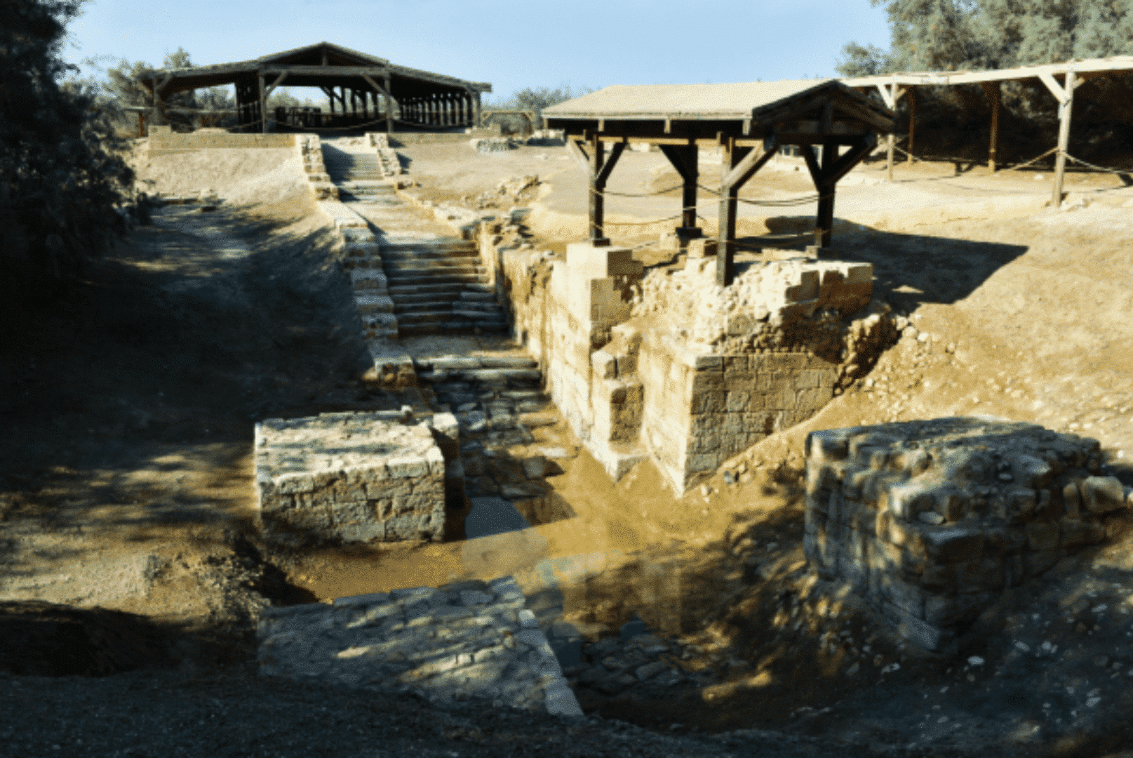 Image of the Baptism Site of Jesus Christ in Bethany, Jordan. Discover the 5 keys to understand what Baptism is. Download Mass Schedules to your cell phone.